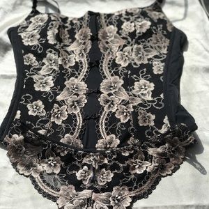 Bustier/corset paired with coordinating panties. Item is new without tags.